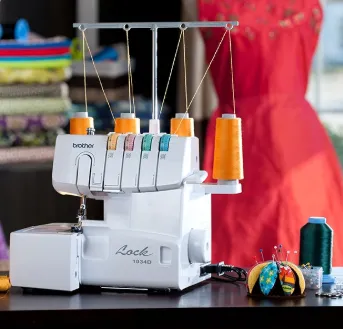 Brother 1034D Serger on table with other sewing notions.