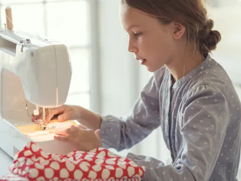 Teen sewing 