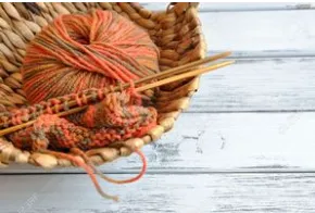 Orange yarn in basket