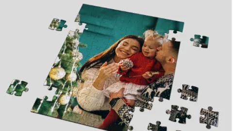 Photo of young family by holiday tree.